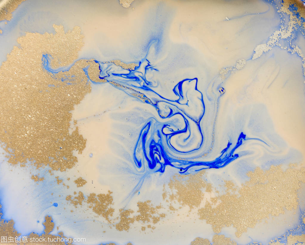 藍色和金色的液體紋理。水彩手繪大理石紋圖。油墨大理石背景